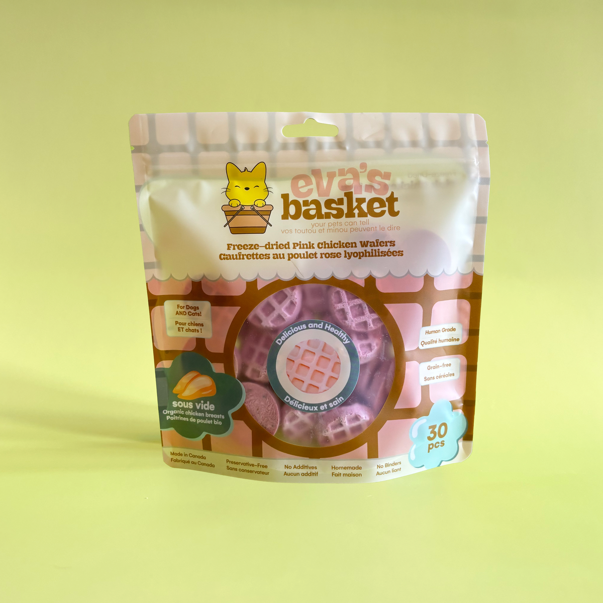 Pink freeze-dried cranberry chicken wafers for dogs and cats by Eva's Basket